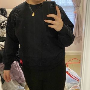 Black crewneck sweater